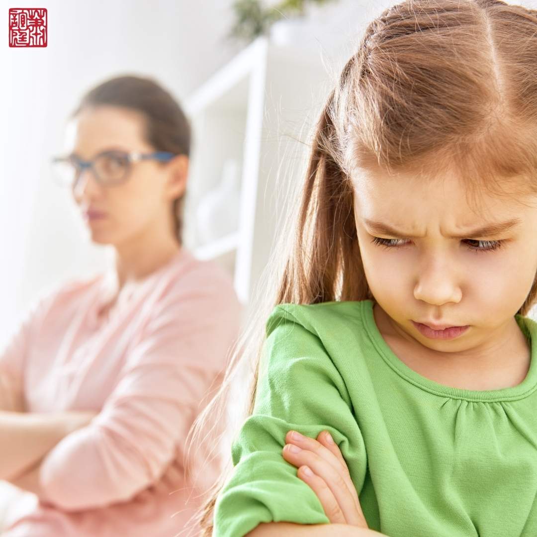 An Image of two girls who are upset which represents Family Feud